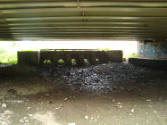 caption: The race way as it existed in 2015, underneath the Route 1 bridge just south of Chadds…