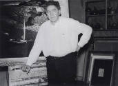 caption: N. C. Wyeth, with Island Funeral on the easel in his Chadds Ford studio (photo by Edwa…