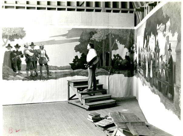 Photograph of N. C. Wyeth in his Chadds Ford, Pennsylvania studio, with sections of the Metropo…