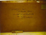 caption: Inscripton on reverse of panel (courtesy of Joyce Hill Stoner)